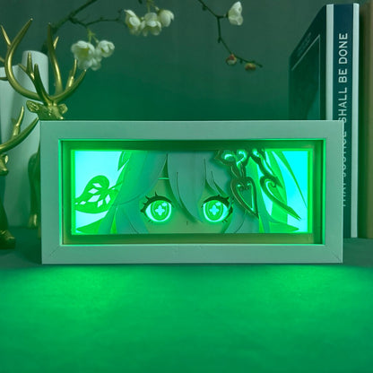 Layered cut paper lamp featuring Nahida on cyan light setting