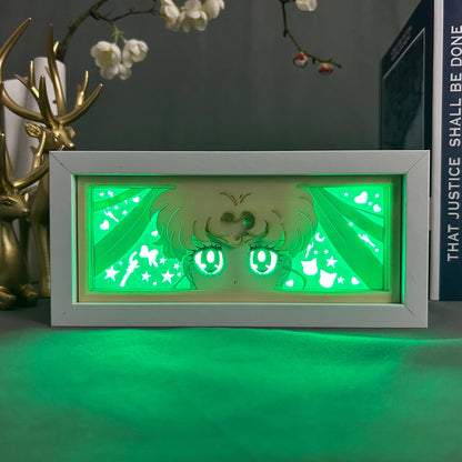 Layered cut paper lamp featuring Usagi Tsukino on green light setting